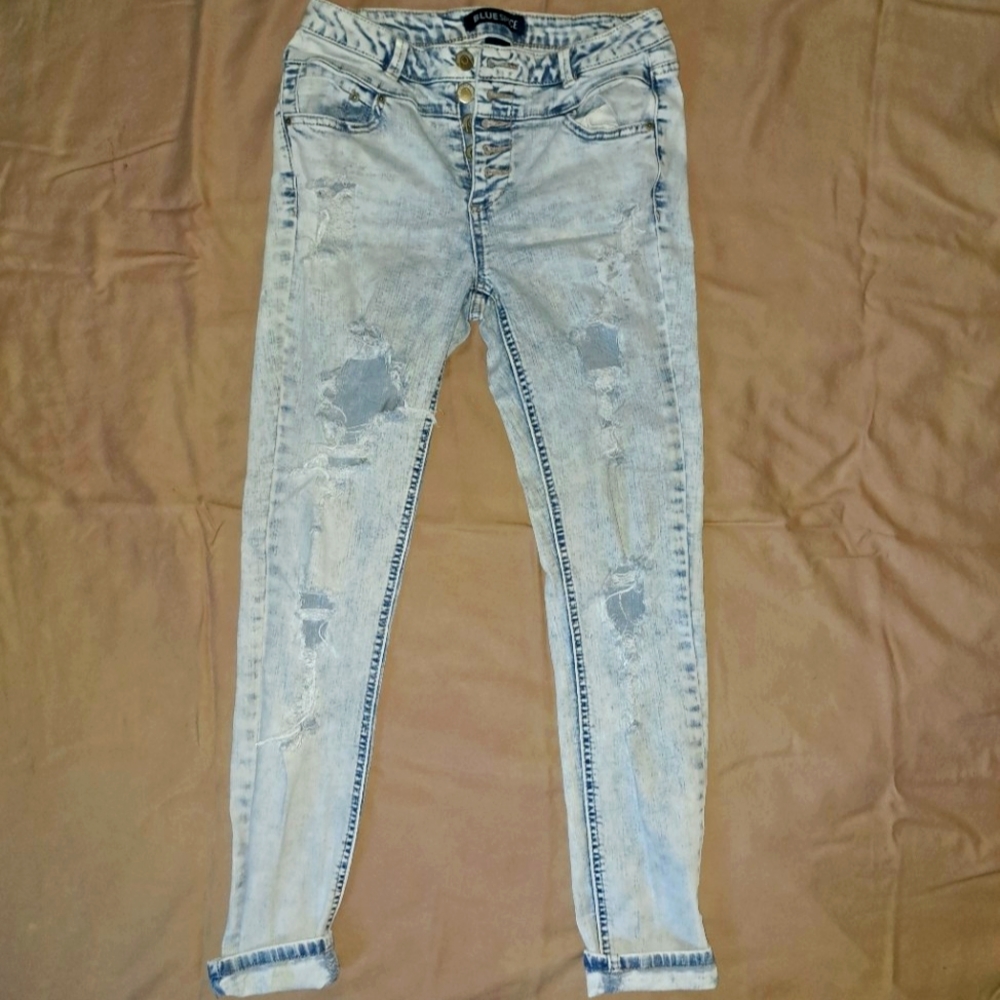 Blue spice ripped Mid rise jegging light wash blue color size 5 womens